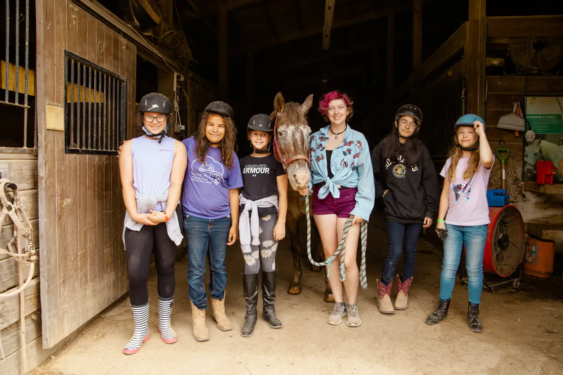 A group of girls at horse camp