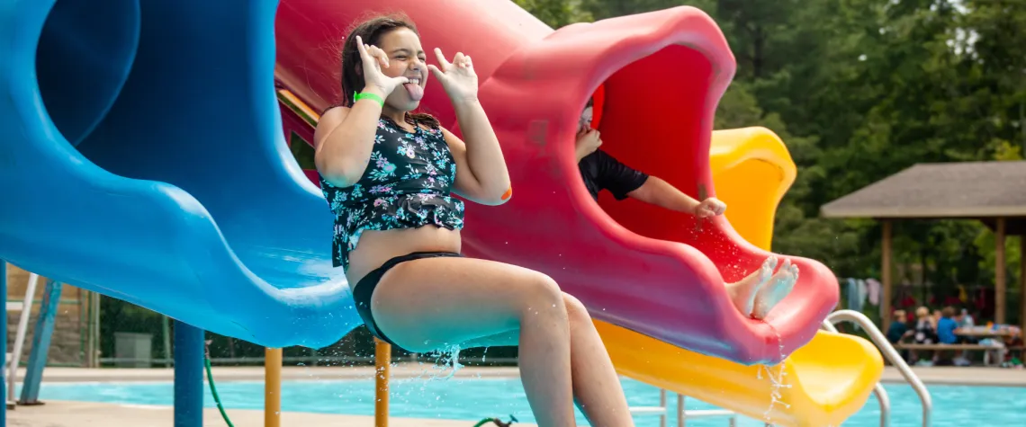 A girl going down the water slide